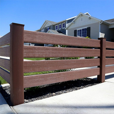 Brown ranch rail fence, one of the many options for wholesale vinyl fencing near Prather, California.