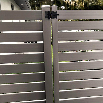 Brown semi-privacy gate, one of the numerous selections for wholesale vinyl gates near Dinuba, California.