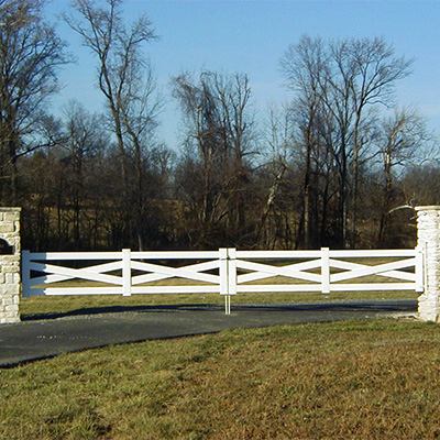White custom ranch rail gate, one of our numerous options for wholesale vinyl gates near Lomita.