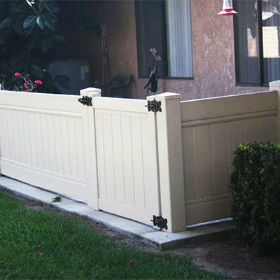 Long Beach wholesale vinyl gate in short tan privacy.