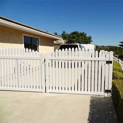 White picket vinyl gate supplied in Valencia, California by Vinyl Craft.