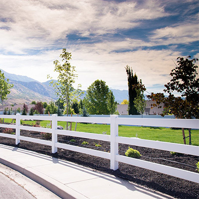 White vinyl picket fencing near Valencia CA supplied by Vinyl Craft.