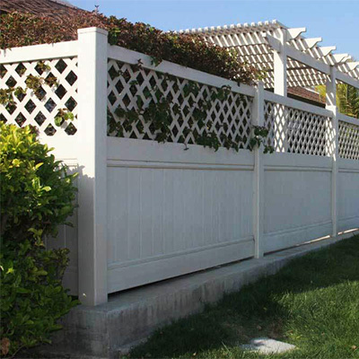 Privacy fencing with lattice top from our Ceres vinyl gate fabricators.