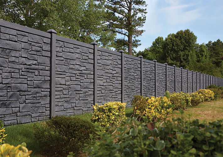 A row of dark gray SimTek fence panels, some of our luxury vinyl fencing near Delhi, California.