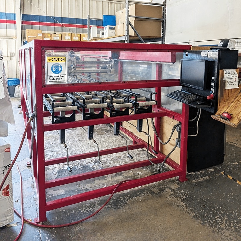 A view of our CNC machine used for Florin vinyl fence and gate fabrication services.