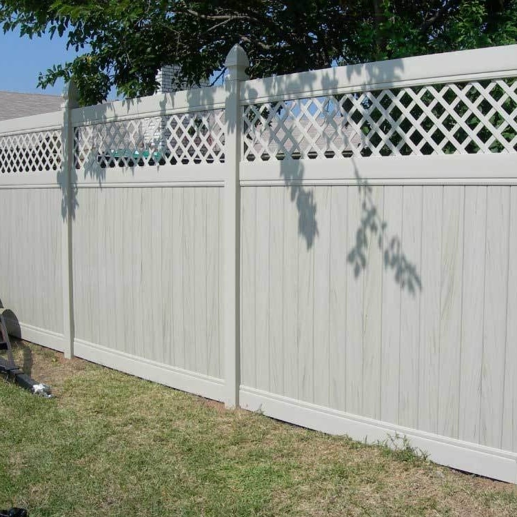A Redondo Beach vinyl privacy fence with lattice top at a residential property.