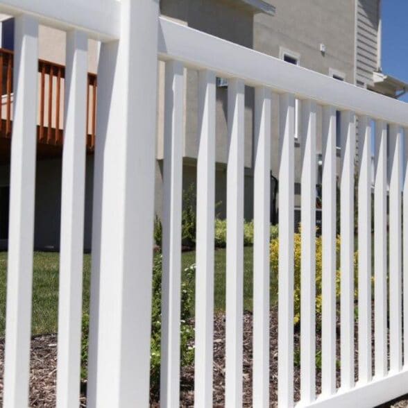 White closed picket vinyl fence, a popular choice for Carson vinyl fencing and gate supplies for contractors and builders.